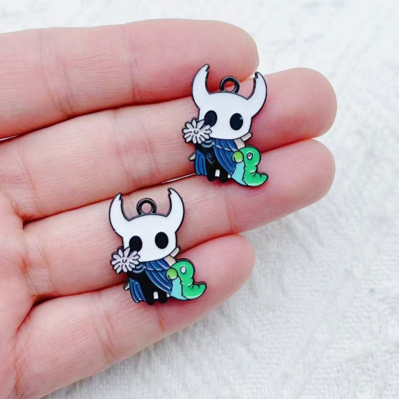 10pcs alloy drip oil cartoon a - Party Games Event 评论和价格